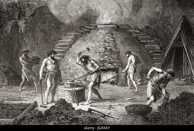 Primitive smelting furnace with workers